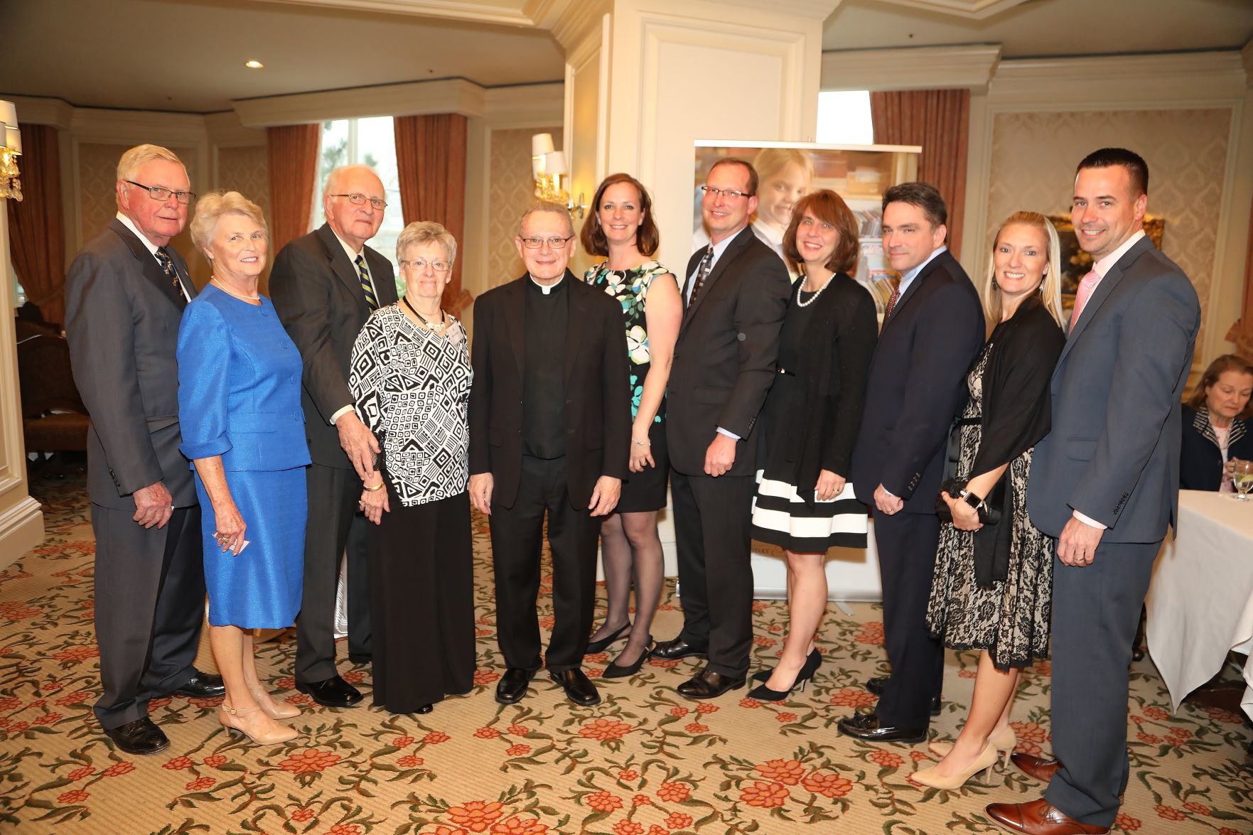 Norm and Adela Pezolt, Tom and Betty Deblase, Monsignor James Callahan, Brigid and Jim Henke, Kathy and Mark Prainito, Cindy and Brian McGee